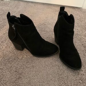Suede black booties by Carlos Santana